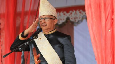 Pj. Wali Kota Asripan Nani Pimpin Upacara HUT ke-17 Kota Kotamobagu dan Hari Kebangkitan Nasional ke-116 di Alun-Alun Boki Hontinimbang