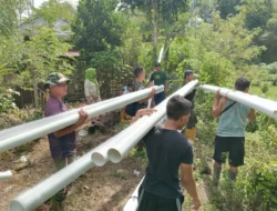 Satgas TMMD dan Warga Desa Modayag Tiga Kolaborasi Pipanisasi untuk Akses Air Bersih