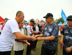 Pj. Wali Kota Kotamobagu Asripan Nani Hadiri Gerakan Pembagian 10 Juta Bendera Merah Putih di HUT RI ke-79