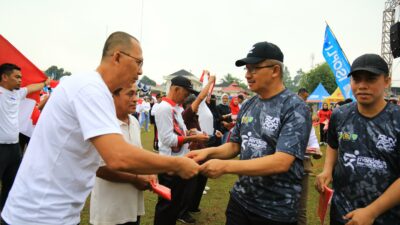 Pj. Wali Kota Kotamobagu Asripan Nani Hadiri Gerakan Pembagian 10 Juta Bendera Merah Putih di HUT RI ke-79