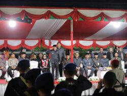 Semarak HUT ke-80 RI, Wali Kota Kotamobagu Pimpin Upacara Taptu dan Lepas Peserta Pawai Obor