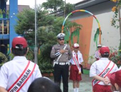 Polisi Sahabat Anak: Satlantas Polres Kotamobagu Tanamkan Semangat Nasionalisme di SDK II Kotamobagu