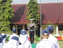 “Hormati Gurumu, Ilmumu Akan Menjadi Berkah”: Police Goes to School Satlantas Polres Kotamobagu di SMP N 9