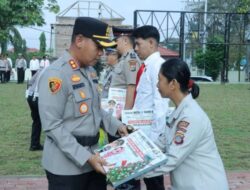 Berbagi Kasih Natal, Kapolres Kotamobagu Hadirkan Kepedulian Penuh Makna untuk Anggota