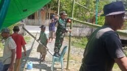 Babinsa Bolangitang Timur Turun Tangan Bantu Warga Pasang Tenda Hajatan