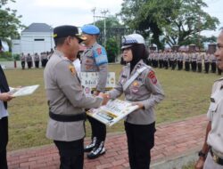 Jelang Nyepi dan Idul Fitri, Kapolres Kotamobagu Bagikan Bingkisan Kasih untuk Personel Lintas Agama